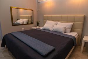 Postel nebo postele na pokoji v ubytování Level 2 Spa Apartman
