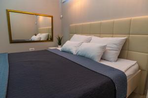 Postel nebo postele na pokoji v ubytování Level 2 Spa Apartman