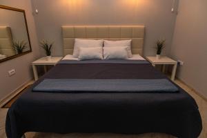 Postel nebo postele na pokoji v ubytování Level 2 Spa Apartman