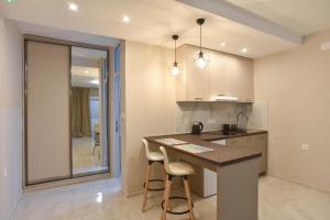 Kuchyň nebo kuchyňský kout v ubytování Apartments Jelušić