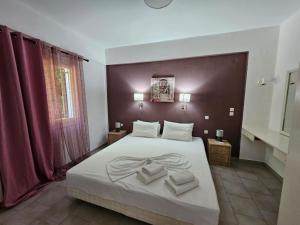 Posteľ alebo postele v izbe v ubytovaní Corfu Glyfada Menigos Resort 149