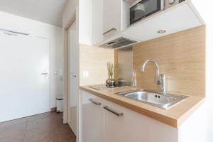 Una cocina o zona de cocina en Appart'City Confort Bordeaux Chartrons