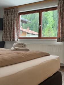 Postel nebo postele na pokoji v ubytování Haus St. Martin