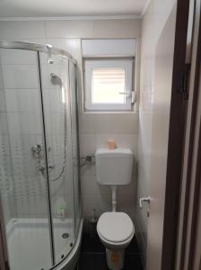 Koupelna v ubytování Studio apartman Tombo