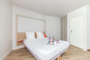 Cama o camas de una habitación en Appart'City Confort Bordeaux Chartrons