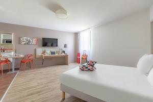 Una cocina o zona de cocina en Appart'City Confort Bordeaux Chartrons