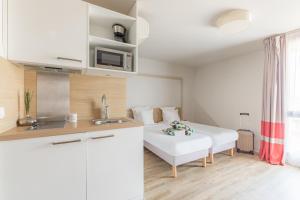 Cama o camas de una habitación en Appart'City Confort Bordeaux Chartrons