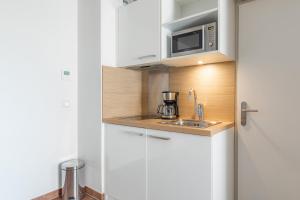 Una cocina o zona de cocina en Appart'City Confort Bordeaux Chartrons