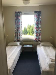Postel nebo postele na pokoji v ubytování Tronsvangen Seter + 25 fotografií