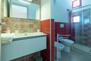 A bathroom at Appartamenti Craulo