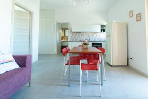 A kitchen or kitchenette at Appartamenti Craulo