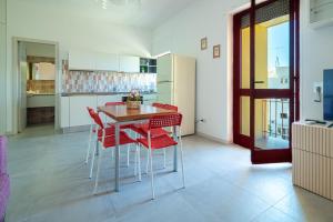 A kitchen or kitchenette at Appartamenti Craulo