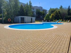 Piscina de la sau aproape de Horyzont Apartamenty- 50m od morza!!!Apartamenty prywatne w Family Dominikana- SELF CHECK IN