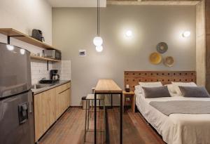 Kuchyň nebo kuchyňský kout v ubytování The Somos Flats Laureles
