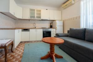 Kuchyň nebo kuchyňský kout v ubytování Apartments and rooms Lotus + 25 fotografií