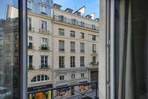 a view of a building from a window at Appartement Neuf Saint-Honoré - Tuileries in Paris