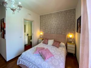Postel nebo postele na pokoji v ubytování La Villa di Tony