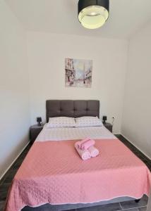 Postel nebo postele na pokoji v ubytování Apartman Ivan