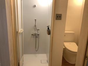a shower in a bathroom with a toilet at Nagano - House - Vacation STAY 14689 in Nagano