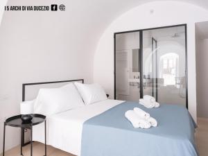 Ένα ή περισσότερα κρεβάτια σε δωμάτιο στο I 5 Archi di Via Ducezio