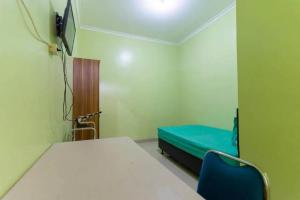 MencilにあるKostawira Syariah Bintaro Mitra RedDoorzのギャラリーの写真