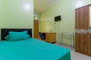 MencilにあるKostawira Syariah Bintaro Mitra RedDoorzのギャラリーの写真