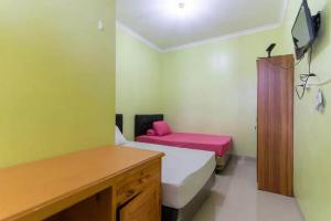 MencilにあるKostawira Syariah Bintaro Mitra RedDoorzのギャラリーの写真