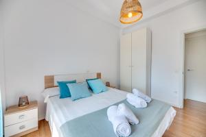 Łóżko lub łóżka w pokoju w obiekcie LXR Vistahermossa 3BDR. Apt Next to sea