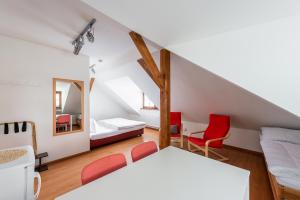 Postel nebo postele na pokoji v ubytování Apartmán Muzeum obchodu