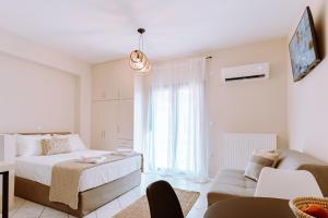 Ένα ή περισσότερα κρεβάτια σε δωμάτιο στο Memories Cozy Studio