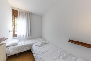 Letto o letti in una camera di La Solana Apartaments & Spa