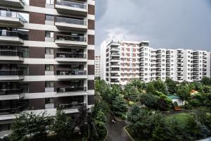 an aerial view of two tall apartment buildings at Luxury Pipera in Voluntari