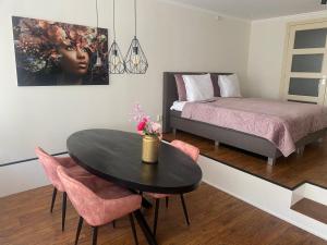 Postel nebo postele na pokoji v ubytování B&B Posthoorn