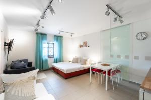 Postel nebo postele na pokoji v ubytování Apartmán Muzeum obchodu