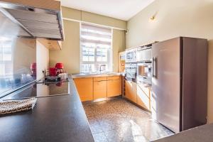 Kuchyň nebo kuchyňský kout v ubytování Hyper center Sauna air conditionner