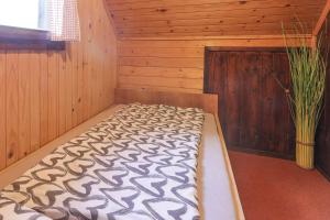 Postel nebo postele na pokoji v ubytování Cottage House Podgosar Bled Pokljuka