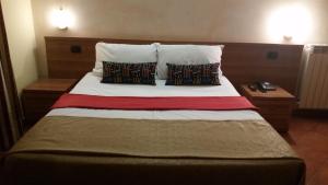 Postel nebo postele na pokoji v ubytování Hotel Chopin