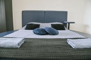 Voodi või voodid majutusasutuse Hedonist-Kapije Lounge & Stay toas