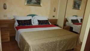 Postel nebo postele na pokoji v ubytování Hotel Chopin