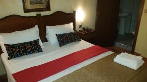 Postel nebo postele na pokoji v ubytování Hotel Chopin