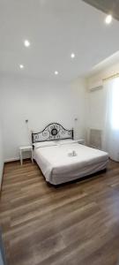 מיטה או מיטות בחדר ב-Il Viale