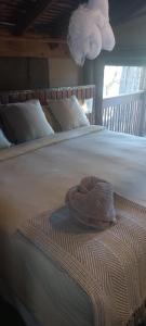 Postel nebo postele na pokoji v ubytování Nako Okavango Guesthouse