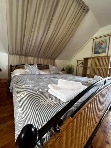 Posteľ alebo postele v izbe v ubytovaní Szőlőskert Studio Apartman Ábrahámhegy