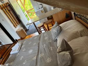 Posteľ alebo postele v izbe v ubytovaní Szőlőskert Studio Apartman Ábrahámhegy