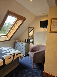 TV o dispositivi per l'intrattenimento presso Smiths Guest House