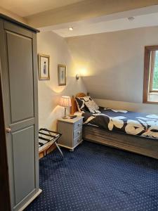 Letto o letti in una camera di Smiths Guest House