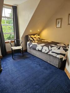 Letto o letti in una camera di Smiths Guest House