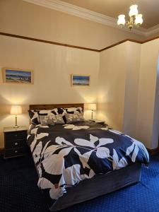 Letto o letti in una camera di Smiths Guest House
