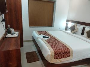 Voodi või voodid majutusasutuse HOTEL SJ PREMIUM toas