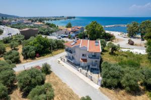 an aerial view of a house with a road at Villa Venetta in Skala Rachoniou